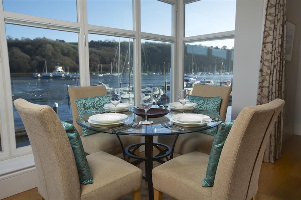 The dining area with lovely river views seats four comfortably (photo 3) at 20 Dart Marina in , Dart Marina