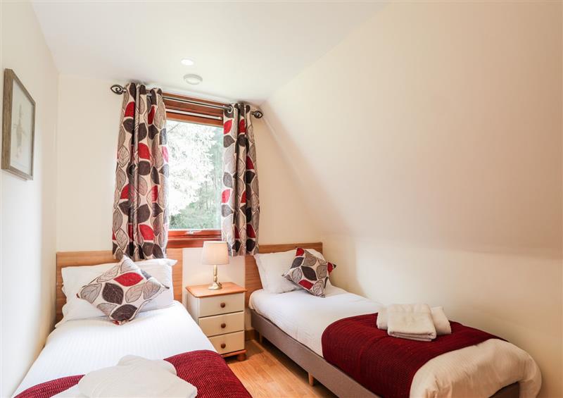 A bedroom in 20 Great Glen Water Park at 20 Great Glen Water Park, South Laggan near Invergarry