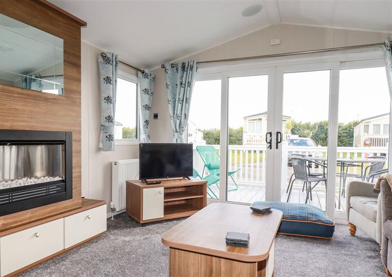 The living room at 205 The Meadows, Newquay