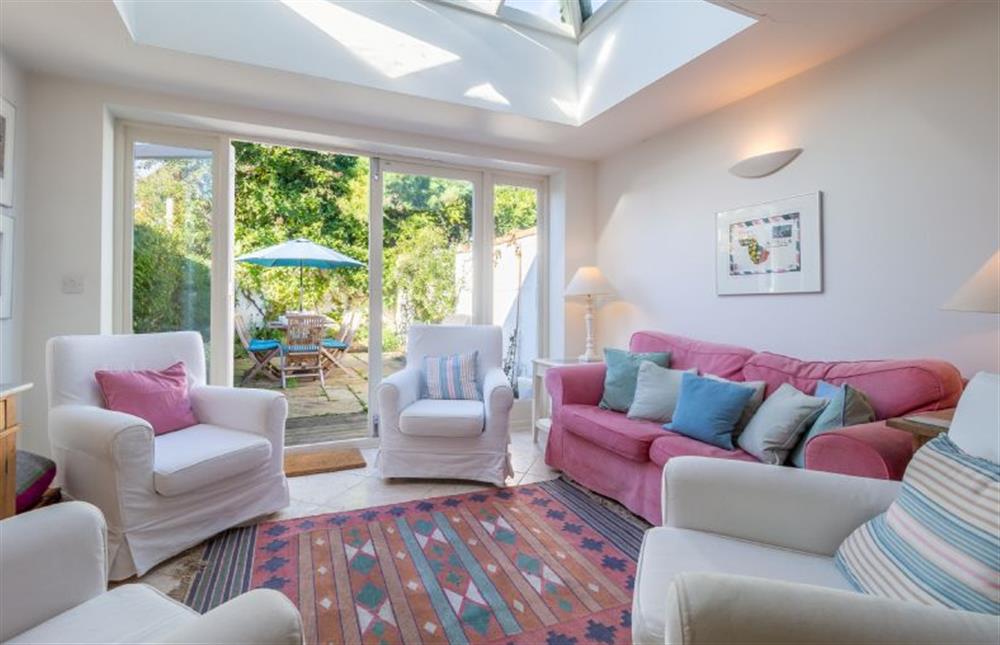 Sun room with lots of comfy seating at 207 High Street, Aldeburgh