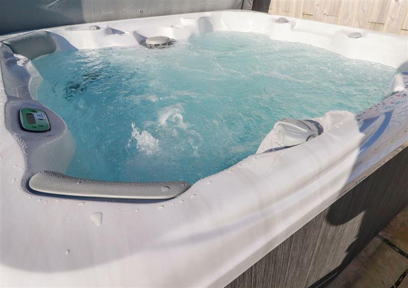 There is a hot tub at 207 The Glades - Retallack Resort and Spa, St Columb Major