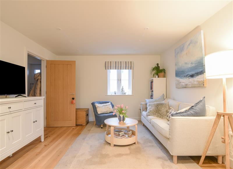 Relax in the living area at 22 Applebee Way, Lyme Regis