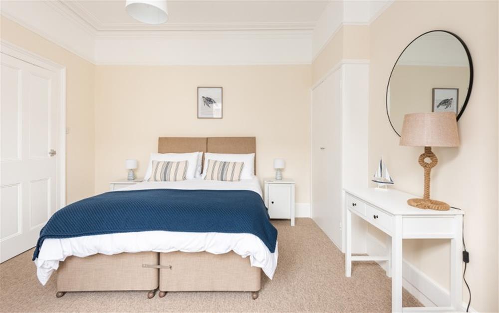Bedroom 1.  Ground floor. Kings size bed. Storage at 22 Courtenay Street in Salcombe