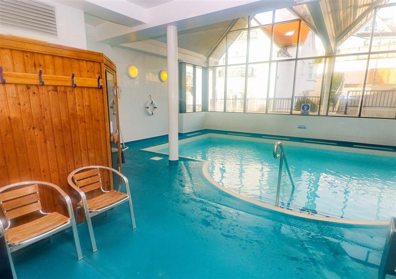 Enjoy the swimming pool at 22 Giltar House, Tenby