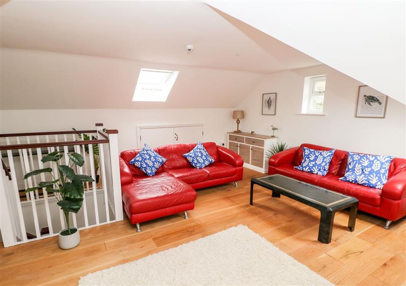 Relax in the living area at 22 Giltar House, Tenby