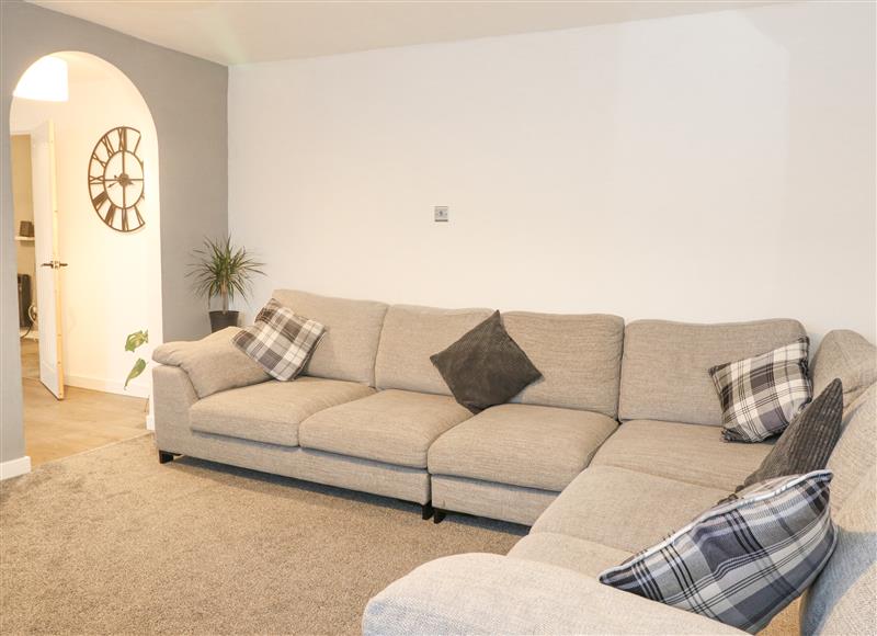 Relax in the living area at 22 Moray Place, Fort William