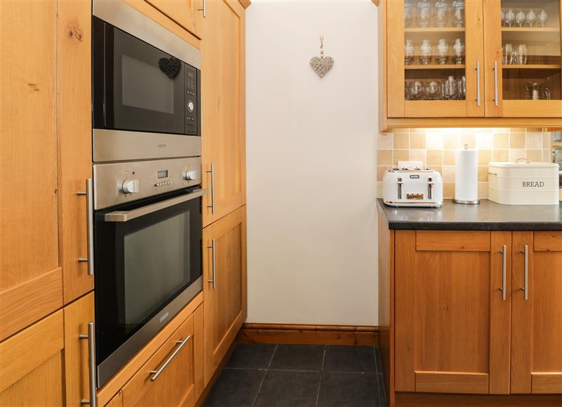 This is the kitchen (photo 2) at 24 Dolithel, Bryncrug near Tywyn