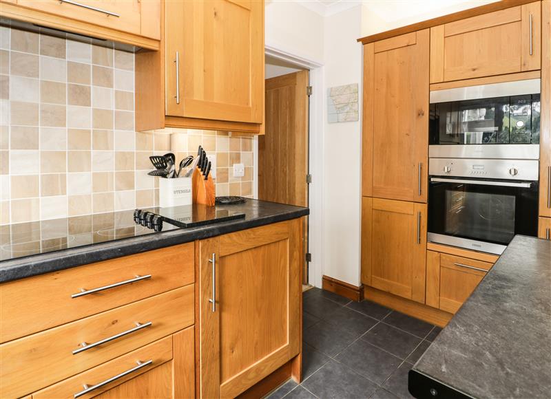 This is the kitchen (photo 3) at 24 Dolithel, Bryncrug near Tywyn