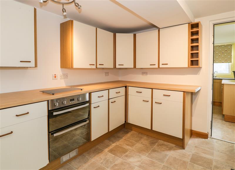 This is the kitchen (photo 4) at 24 Dolithel, Bryncrug near Tywyn