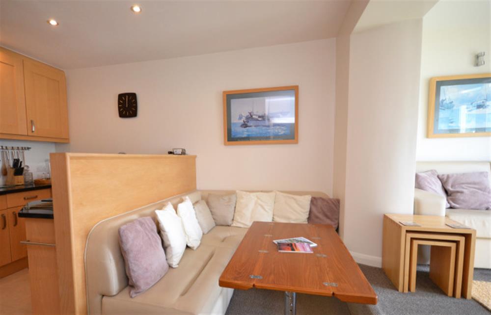The secondary seating area with coffee/dining table at 24 The Salcombe, Salcombe