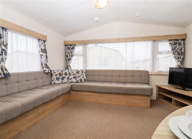 Relax in the living area at 24 Winchelsea Sands Holiday Park, Winchelsea Beach