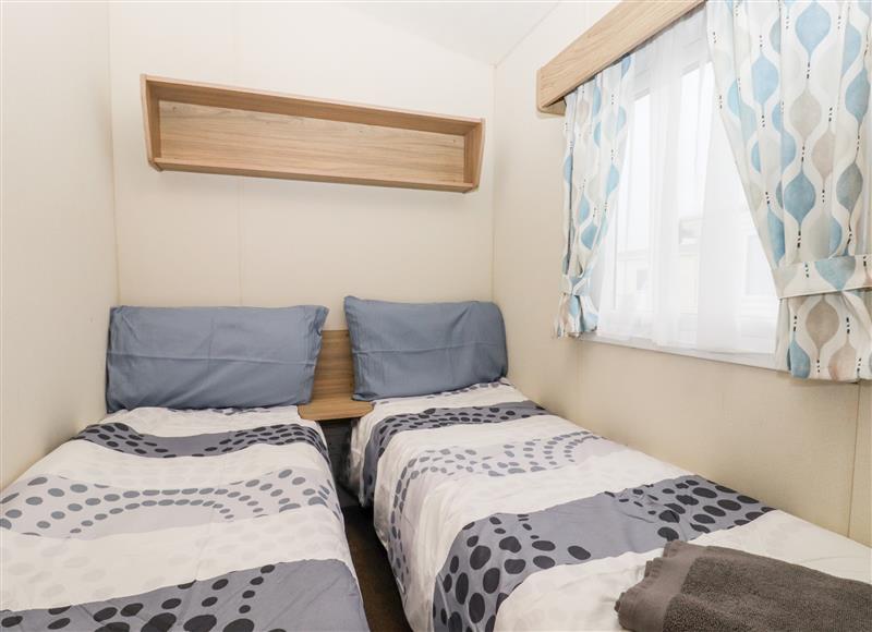 This is a bedroom at 24 Winchelsea Sands Holiday Park, Winchelsea Beach