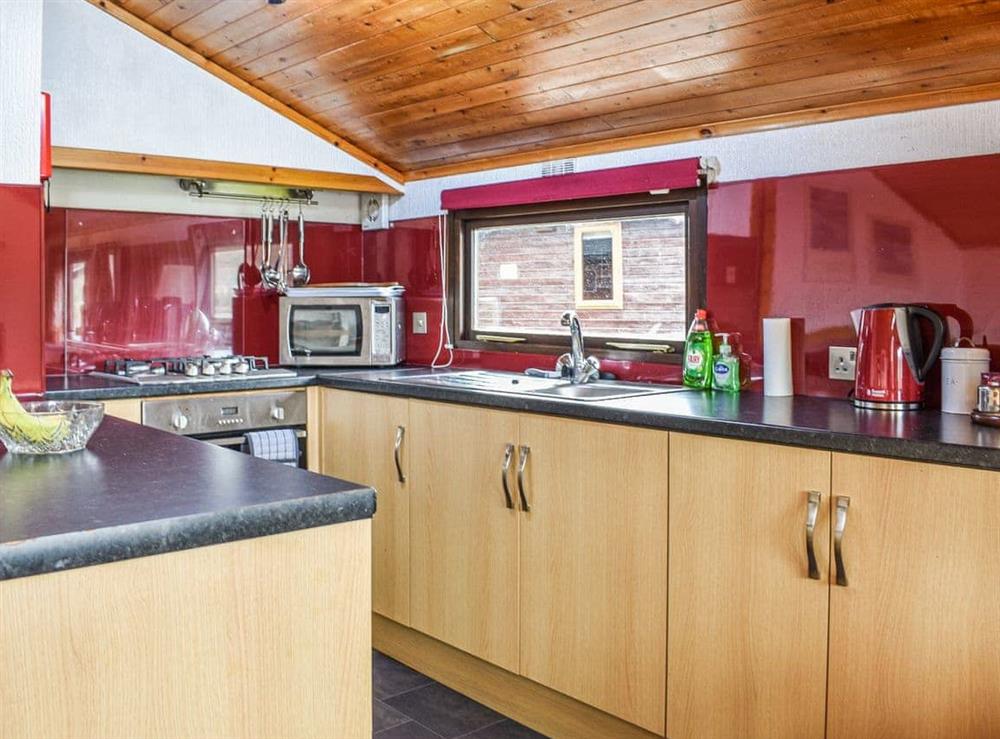 Kitchen at 27 Aviemore Holiday Park in Aviemore, Inverness-Shire