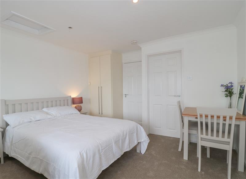 One of the bedrooms at 27 Fernhill Heights, Charmouth