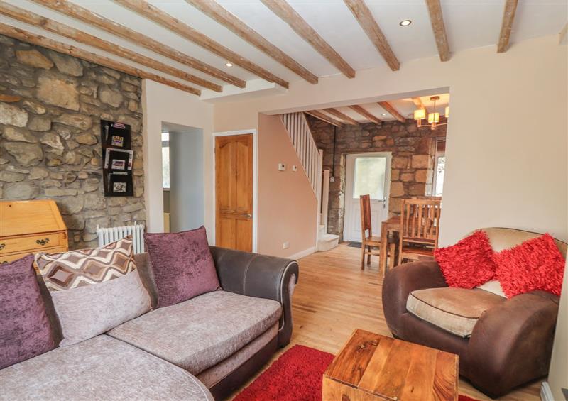 Relax in the living area at 27 Green Road, Brymbo