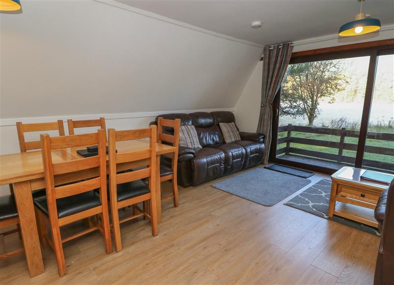 Relax in the living area at 27 Invergarry Lodges, South Laggan near Invergarry