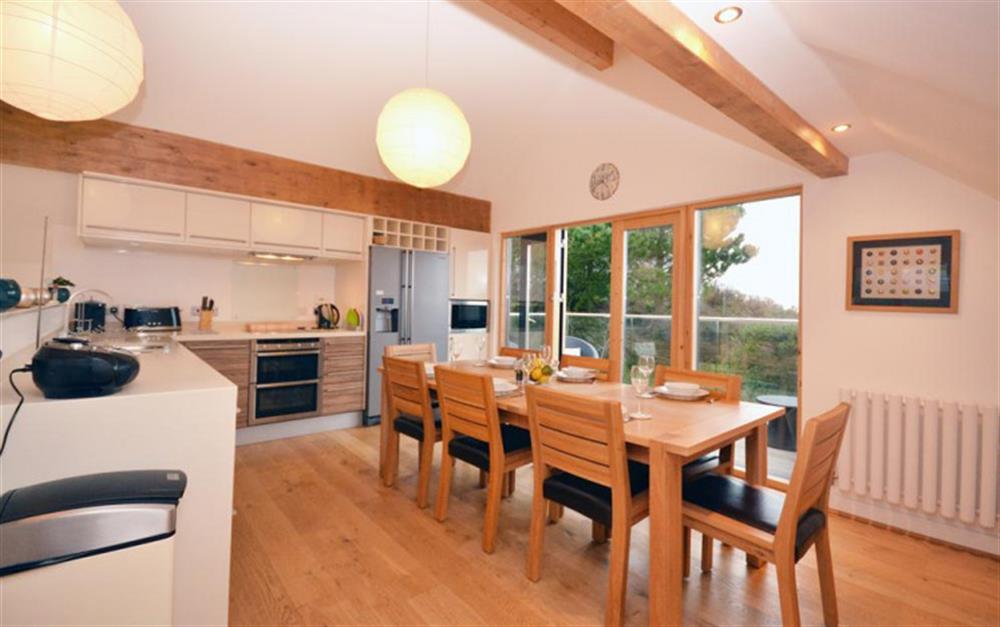 The kitchen and dining area at 27 Talland in Talland Bay