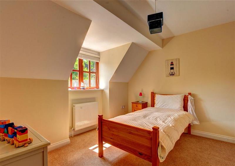 A bedroom in 28 Barnes Meadow (photo 3) at 28 Barnes Meadow, Uplyme