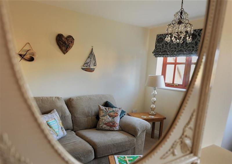 Relax in the living area at 28 Barnes Meadow, Uplyme