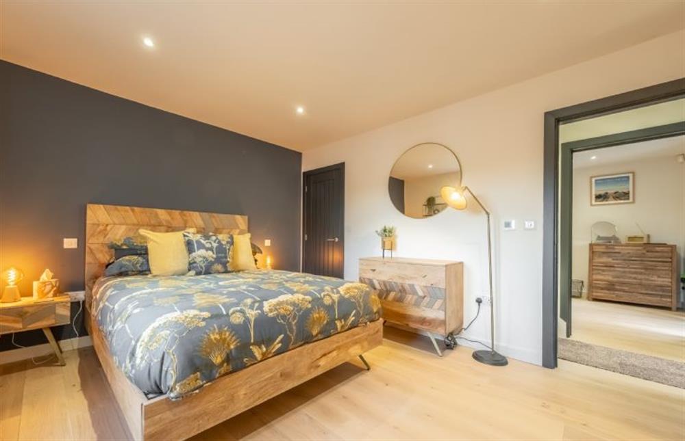 Master bedroom with 5’ king-size bed at 28 Chapel Yard, Wells-next-the-Sea