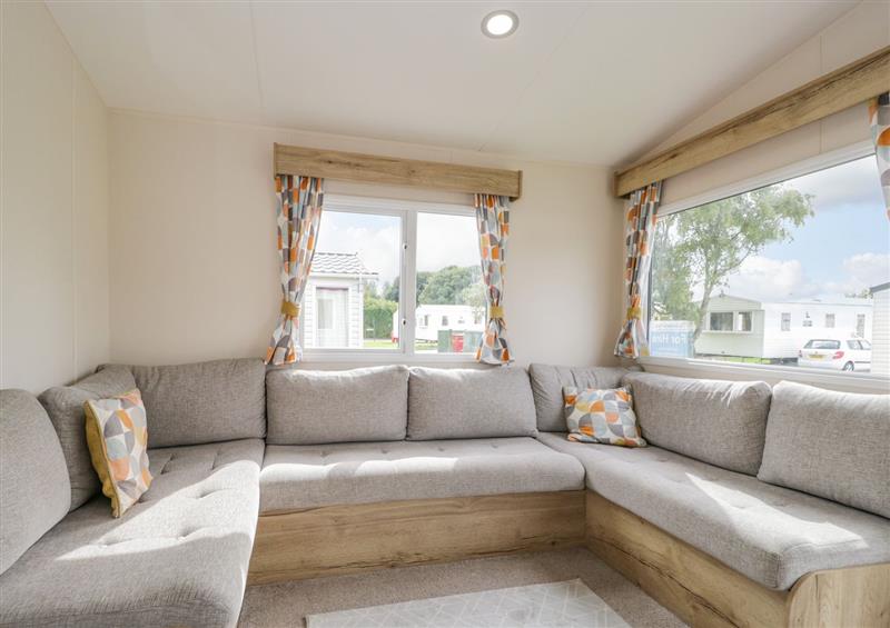 Enjoy the living room (photo 2) at 28 Coniston, Flookburgh