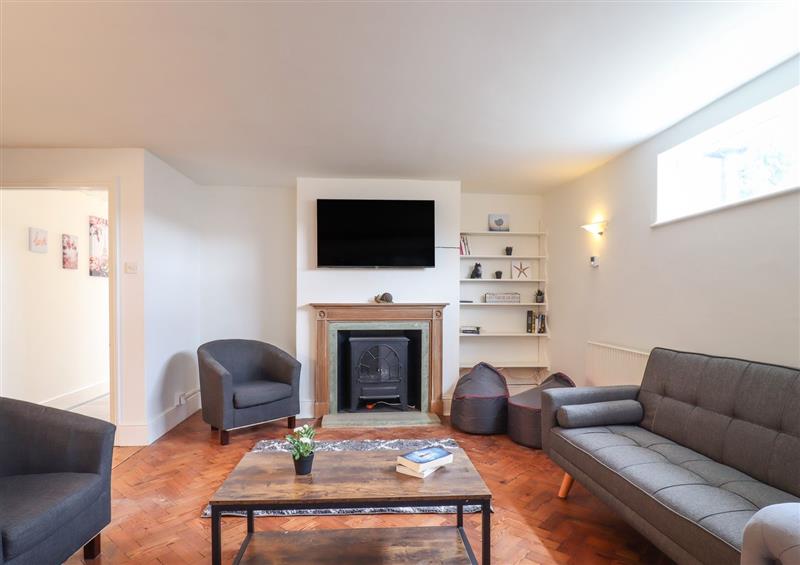 Relax in the living area at 28A Burfield Road, Old Windsor
