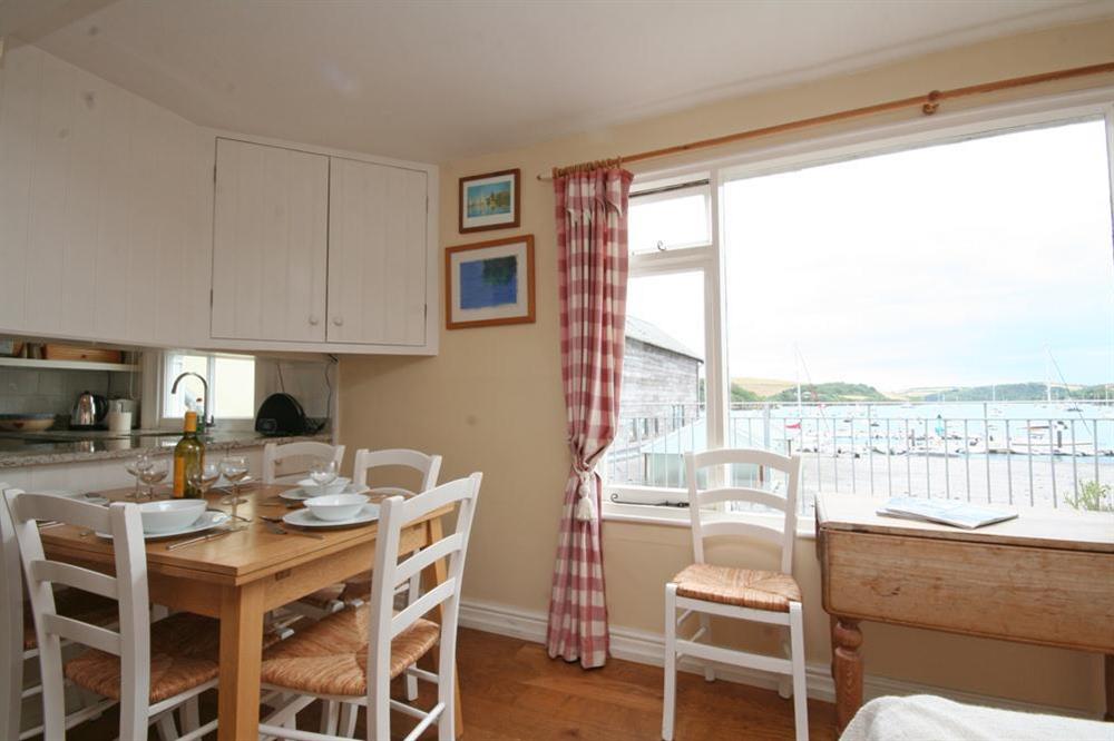 Dining area with excellent views across the estuary and main anchorage to the hills beyond at 29 Fore Street in Fore Street, Salcombe