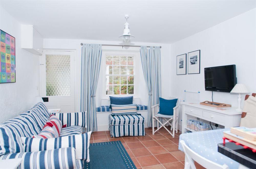 Sitting/Dining Room with sofa and flatscreen TV at 29 Island Street in , Salcombe