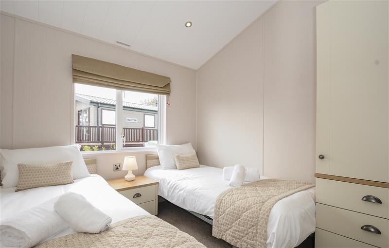 A bedroom in 3 Bed Lodge (Plot 73 with Pets) at 3 Bed Lodge (Plot 73 with Pets), Brixham
