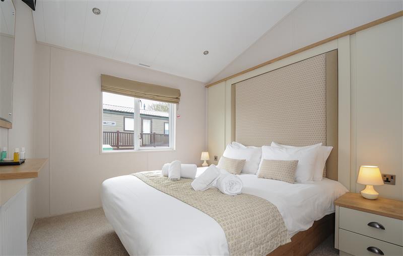 This is a bedroom at 3 Bed Lodge (Plot 73 with Pets), Brixham