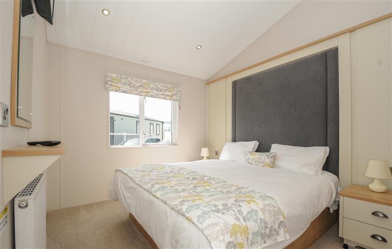 A bedroom in 3 bed lodge Plot B009 at 3 bed lodge Plot B009, Brixham