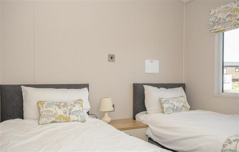 One of the bedrooms at 3 bed lodge Plot B009, Brixham