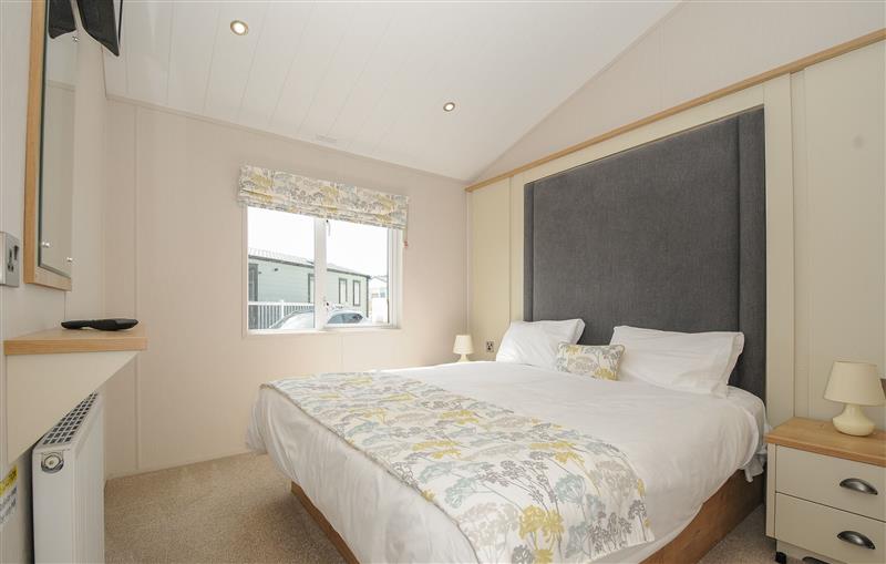 A bedroom in 3 bed lodge Plot B011 at 3 bed lodge Plot B011, Brixham