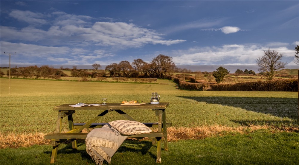The outdoor seating at 3 Cart Lodge Barn in Upper Sheringham, Norfolk