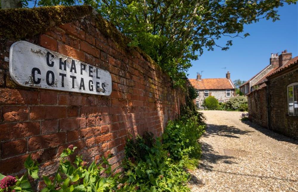 A Chapel Cottages sign at the end of the driveway at 3 Chapel Cottages, Docking near Kings Lynn