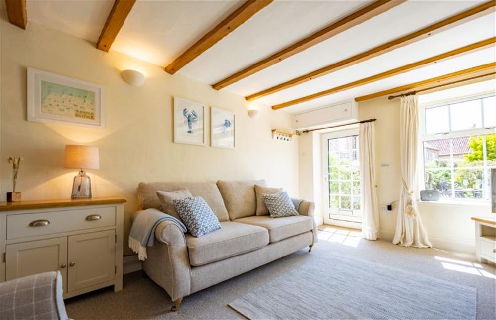 Ground floor: A light filled sitting room at 3 Chapel Cottages, Docking near Kings Lynn