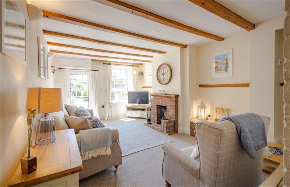 Ground floor: Sitting room with wood burning stove at 3 Chapel Cottages, Docking near Kings Lynn