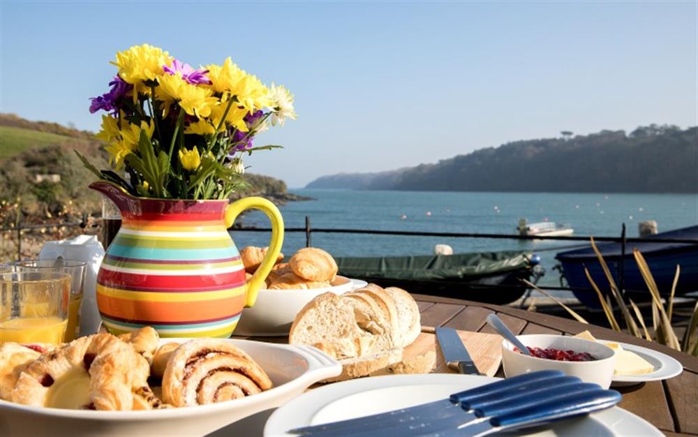 Enjoy al fresco breakfast and what a view! at 3 Coastguard Cottage, River View in Helford Passage