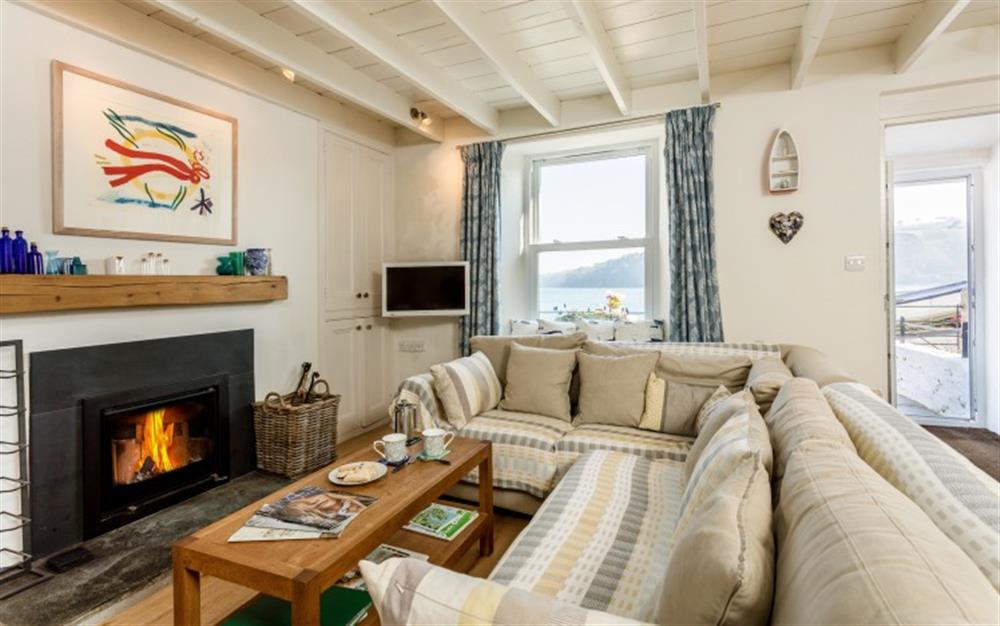 The lounge is quite contemporary but cosy. at 3 Coastguard Cottage, River View in Helford Passage