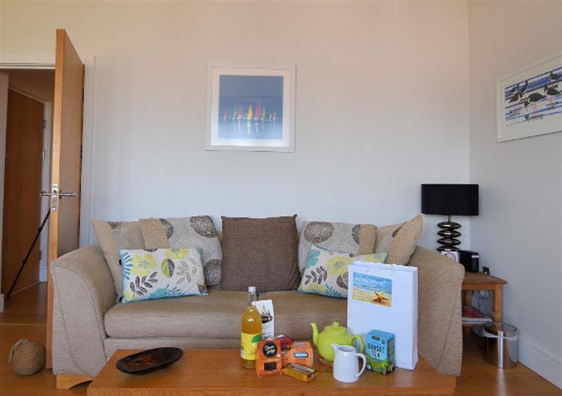 Relax in the living area (photo 2) at 3 Coram Tower, Lyme Regis