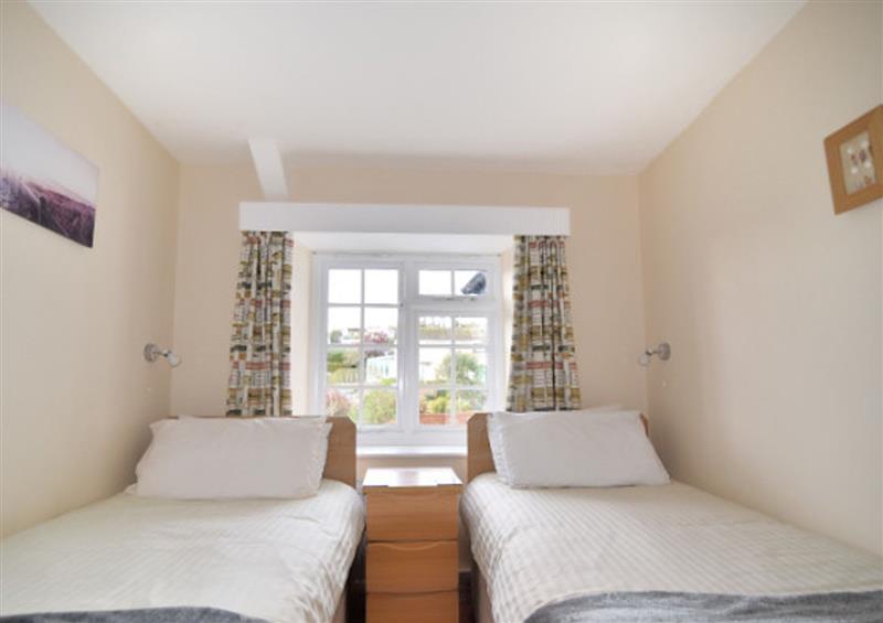 This is a bedroom at 3 Dolphin Cottages, Lyme Regis