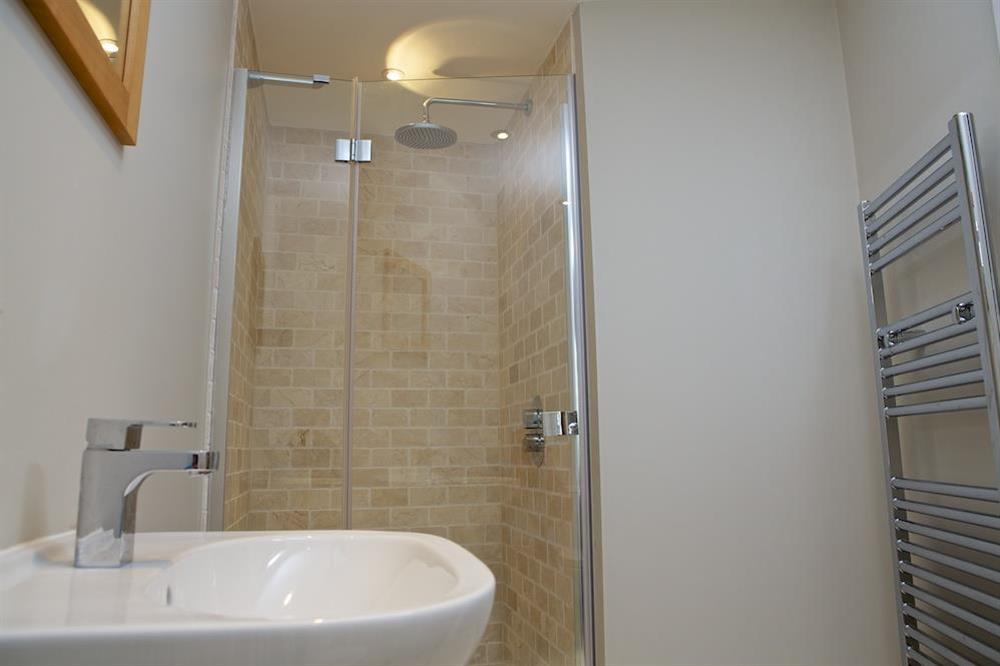 Shower room adjacent to the ground floor bedroom at 3 Eddystone Row in , Salcombe