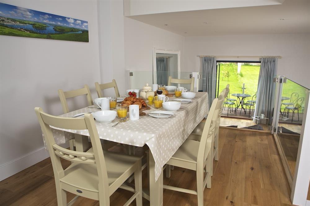 Spacious dining area with table and chairs seating eight at 3 Eddystone Row in , Salcombe