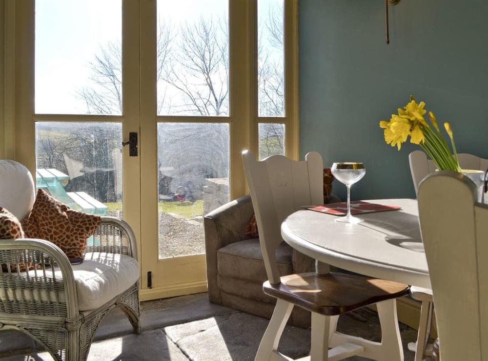 Light and airy dining room at 3 Gill Edge Cottages in Bainbridge, near Hawes, North Yorkshire