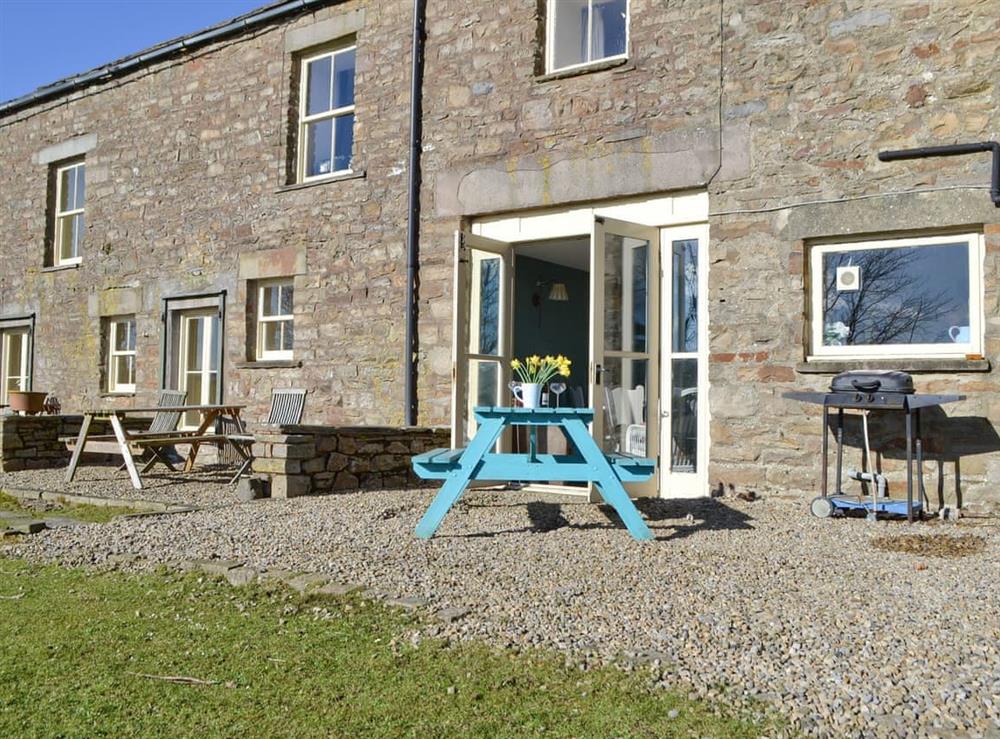 Patio seating area at rear of property at 3 Gill Edge Cottages in Bainbridge, near Hawes, North Yorkshire