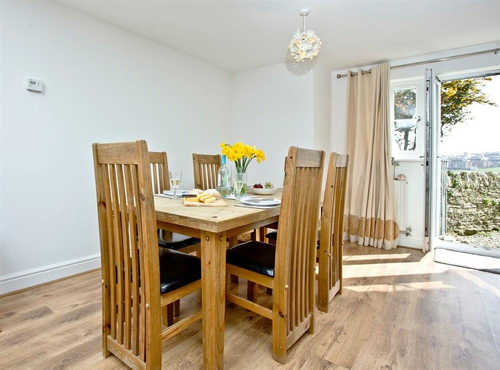 Attractive dining area at 3 Harbour View in Newquay, Cornwall