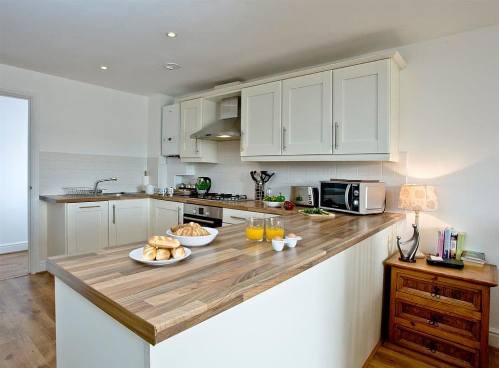 Modern kitchen area at 3 Harbour View in Newquay, Cornwall