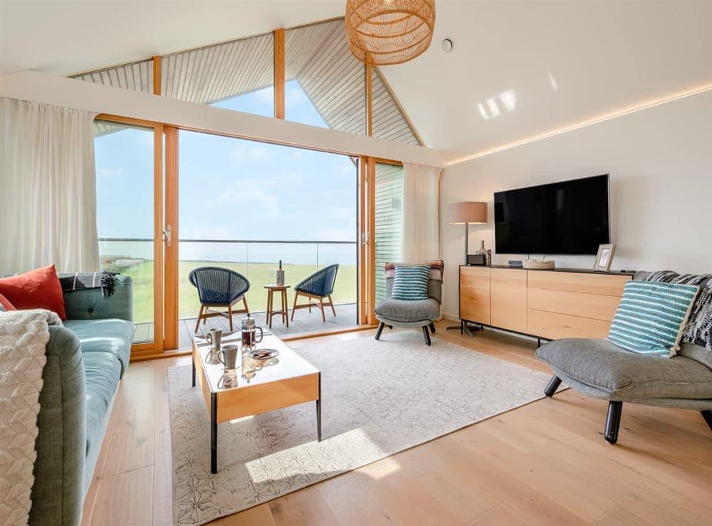 Open plan living space at 3 Karn Havos in Mawgan Porth, Cornwall