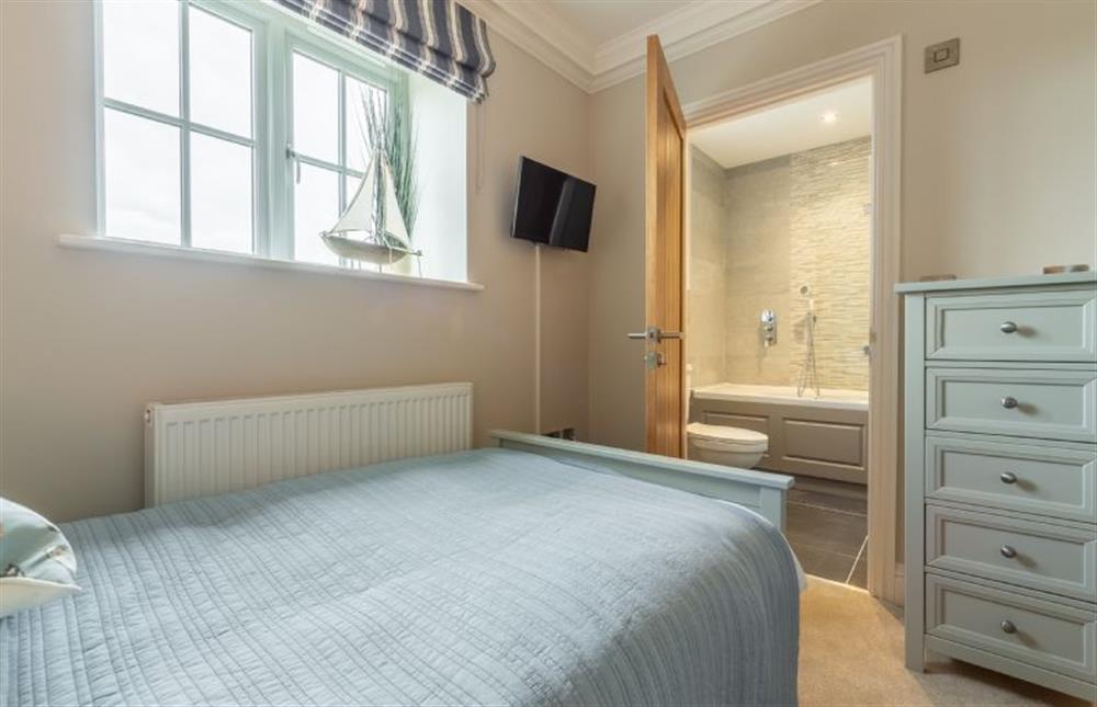 First floor: Bedroom three to en-suite at 3 Knights  Cottages, Thornham near Hunstanton