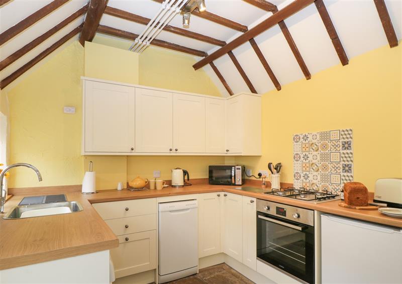 This is the kitchen at 3 Lake Cottages, Prestbury